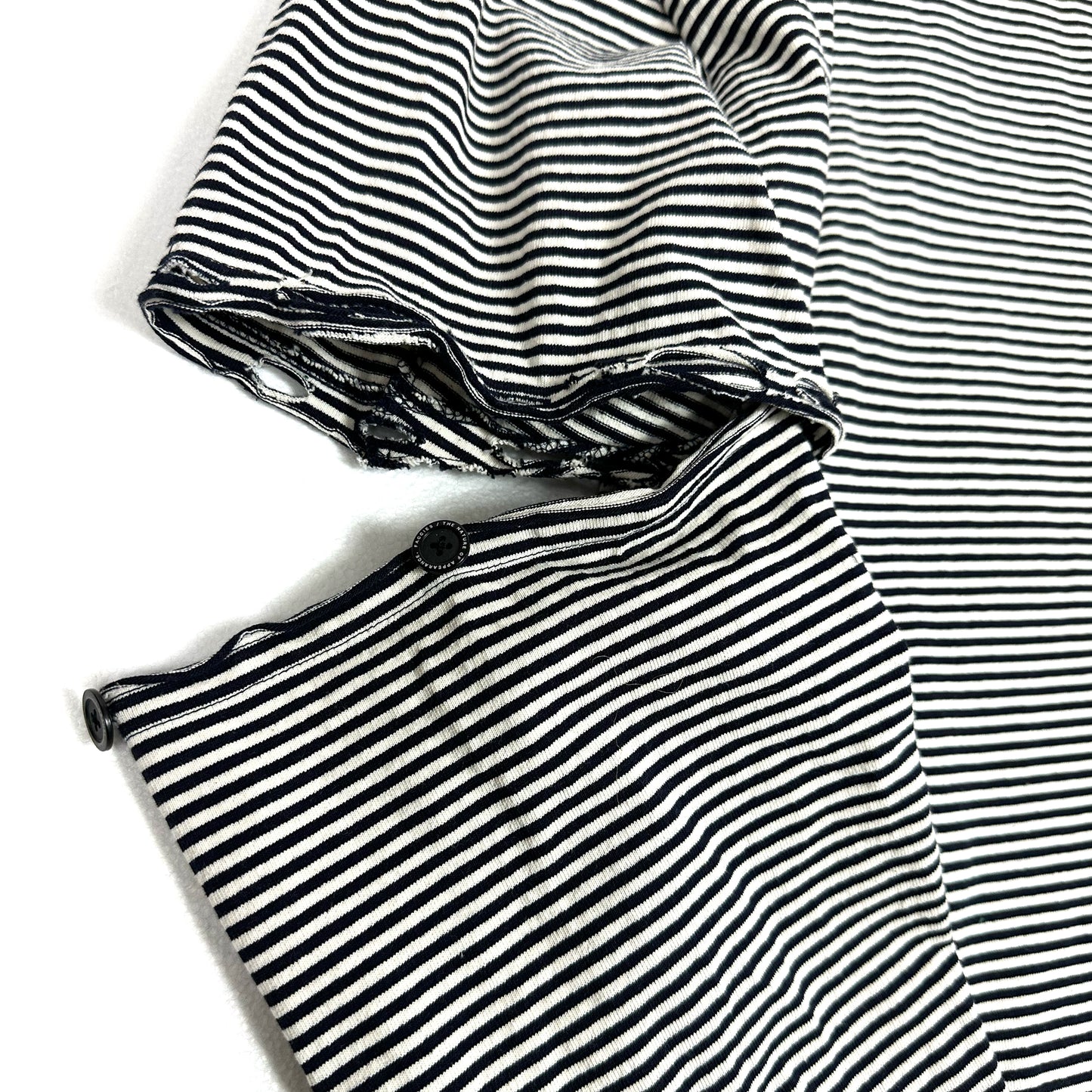 F24W02001-2 US COTTON BORDER LS (DAMAGE)